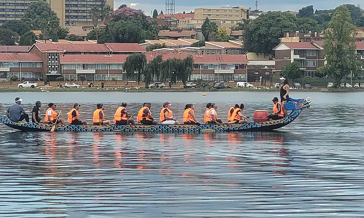 Gauteng Dragon Boat Association. A single dragon boat on Florida Lake, Johannesburg.