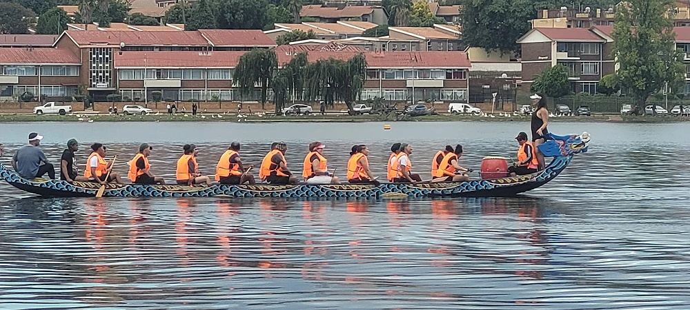 Gauteng Dragon Boat Association. A single dragon boat on Florida Lake, Johannesburg.