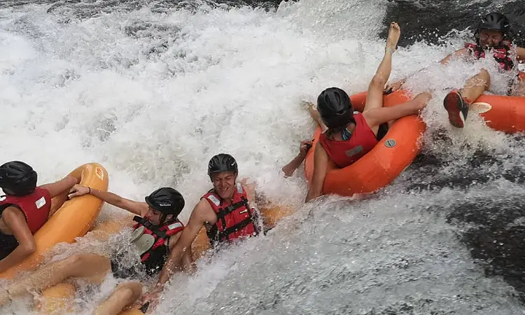 Kestell Adventures. A group of children tubing down the river.