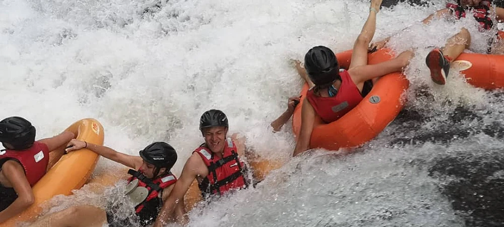 Kestell Adventures. A group of children tubing down the river.
